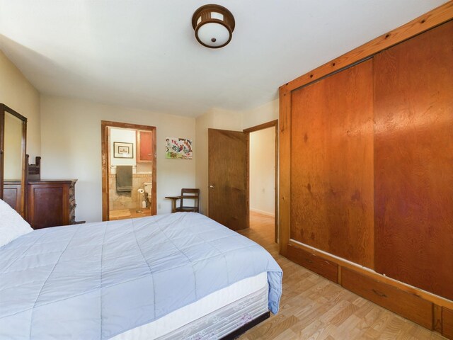 bedroom with light hardwood / wood-style flooring