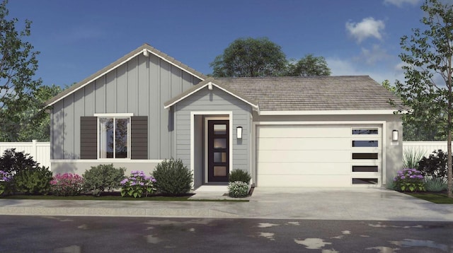 1625 Bloom Ave, Clovis, CA 93619 - view of front of house featuring board and batten siding, concrete driveway, and a garage