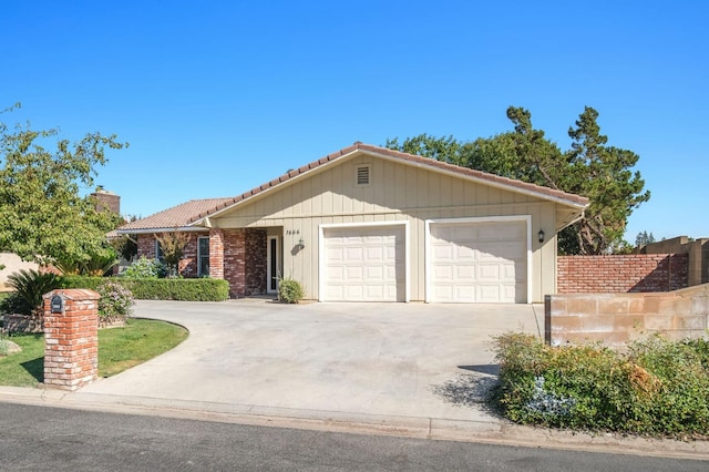 ranch-style home with a garage