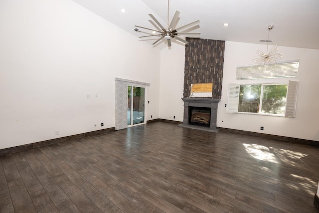 unfurnished living room featuring high vaulted ceiling, ceiling fan, and dark hardwood / wood-style flooring