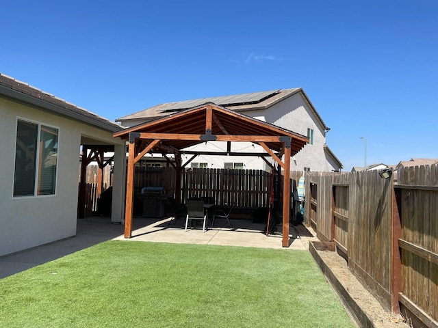 view of yard with a gazebo and a patio