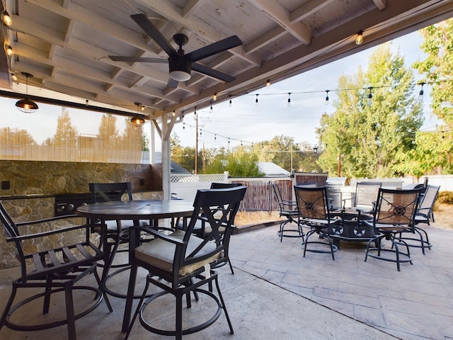 view of patio / terrace featuring ceiling fan