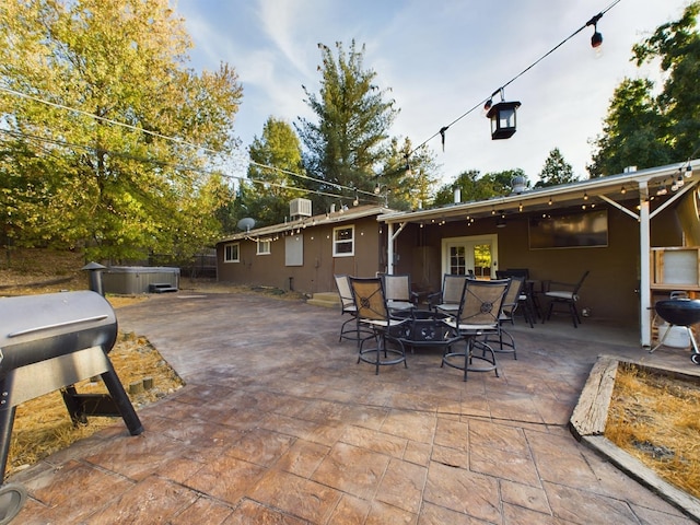 view of patio featuring a grill