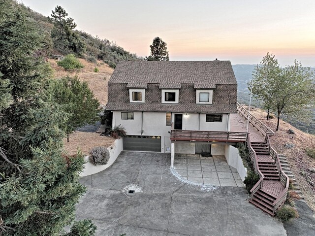 exterior space with a garage