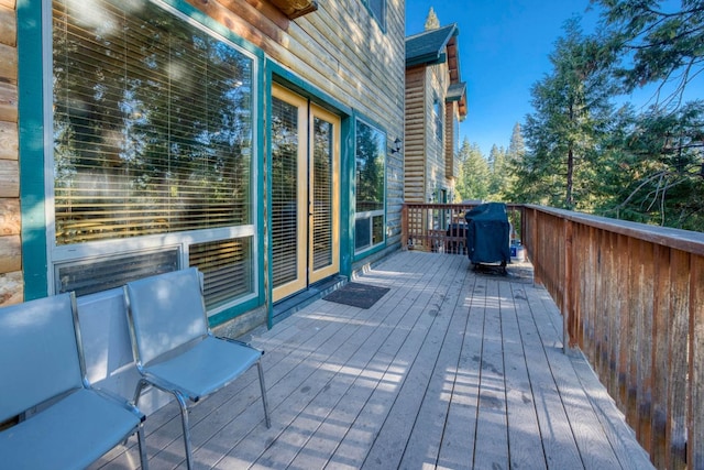 wooden deck with area for grilling