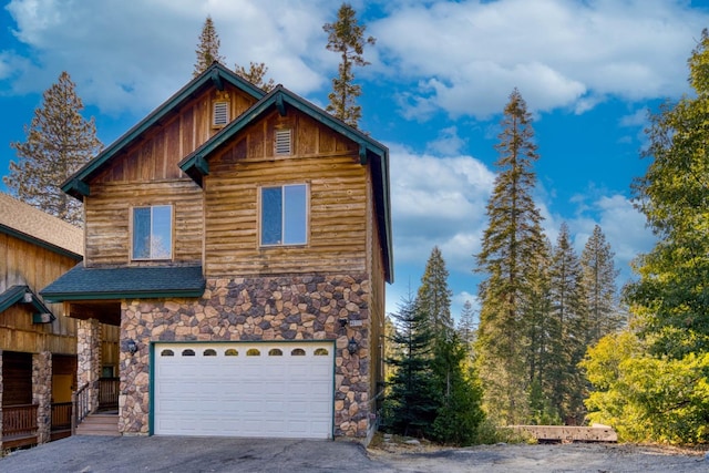 view of front of property with a garage