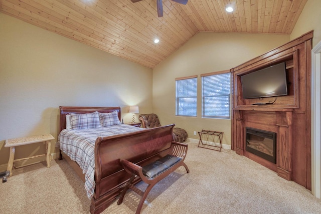 bedroom with lofted ceiling, wood ceiling, and light colored carpet