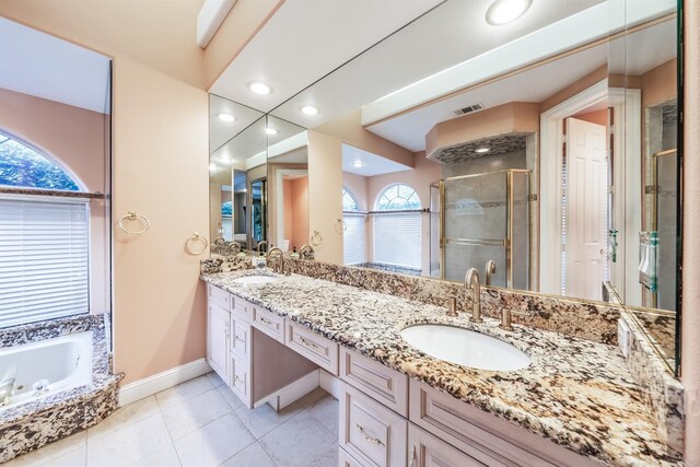 bathroom featuring separate shower and tub, vanity, tile patterned floors, and plenty of natural light