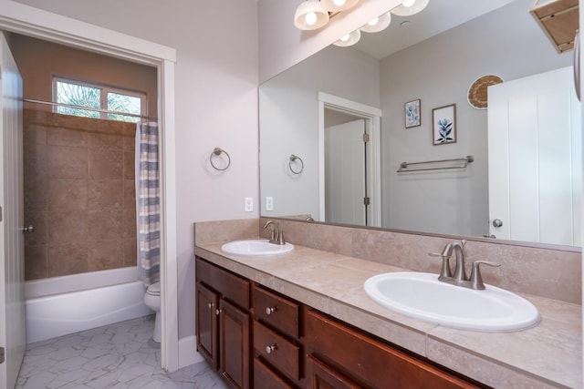 full bathroom with vanity, toilet, and shower / bath combo