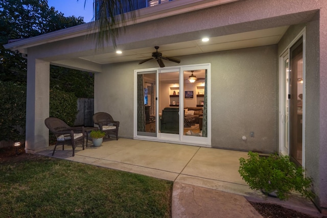 view of patio / terrace featuring ceiling fan