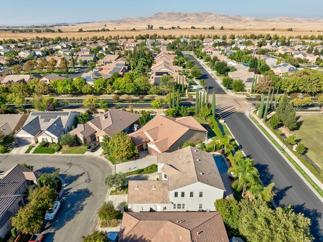 drone / aerial view featuring a mountain view