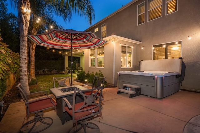 view of patio with a hot tub