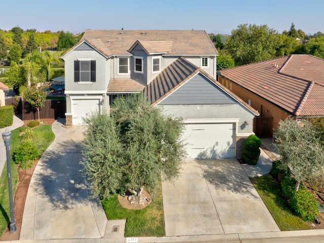 front of property with a garage