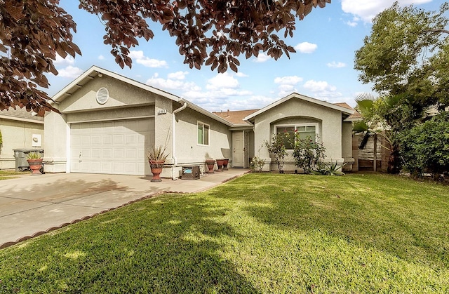 ranch-style house with a front yard and a garage