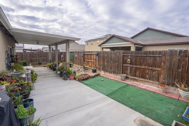 view of patio with ceiling fan