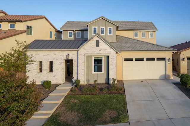 view of front of home featuring an attached garage, board and batten siding, and driveway