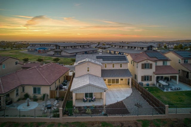 aerial view at dusk with a residential view