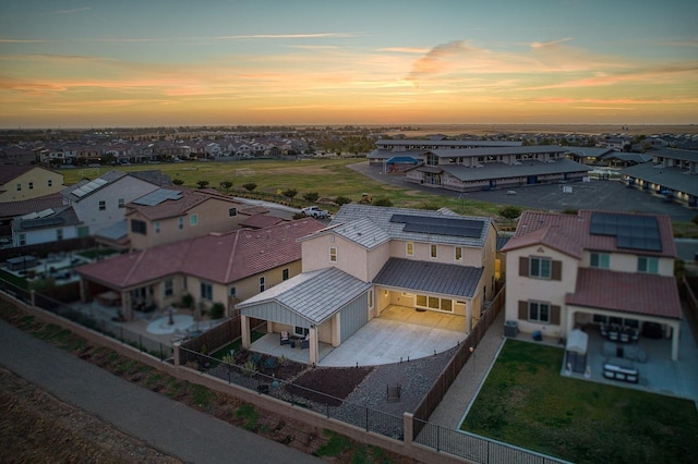 aerial view at dusk with a residential view
