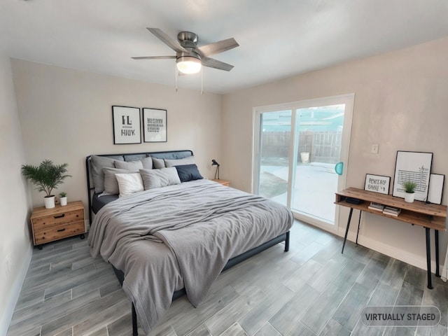 bedroom with hardwood / wood-style floors, access to exterior, and ceiling fan