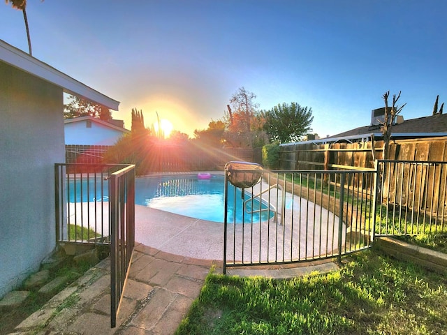 view of swimming pool featuring a patio