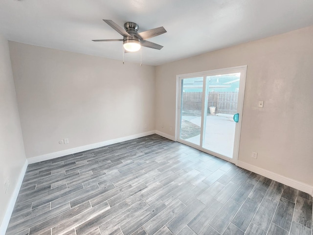 unfurnished room featuring ceiling fan and hardwood / wood-style floors