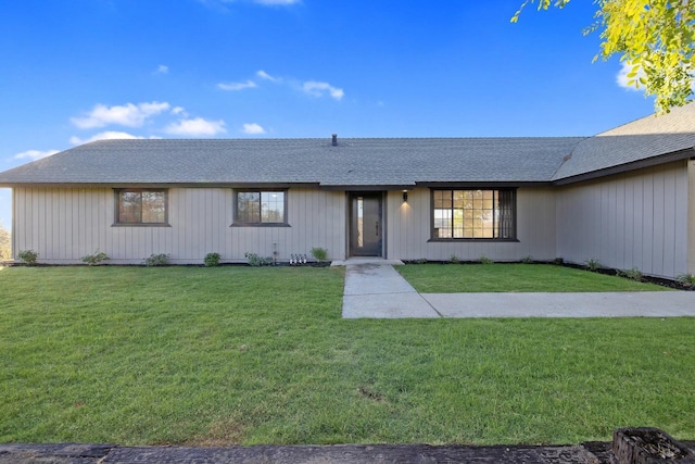 ranch-style home with a front yard