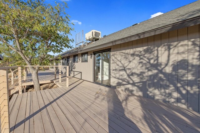 wooden deck with central AC