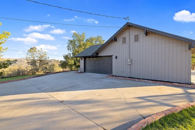 view of home's exterior with a garage