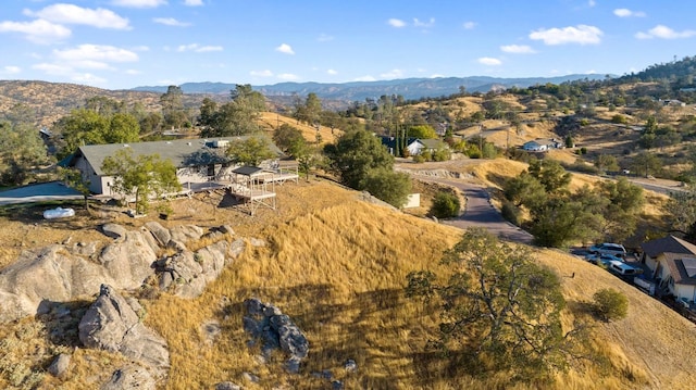 bird's eye view with a mountain view