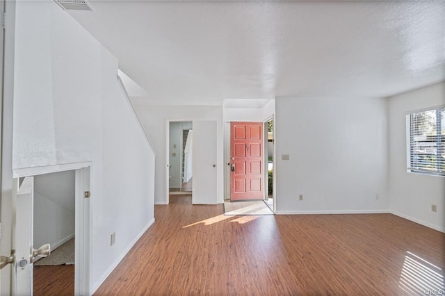 49400 River Park Rd Unit 17, Oakhurst, CA 93644 - foyer entrance with wood finished floors and baseboards