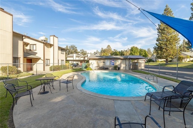 49400 River Park Rd Unit 17, Oakhurst, CA 93644 - view of swimming pool with a residential view and a patio
