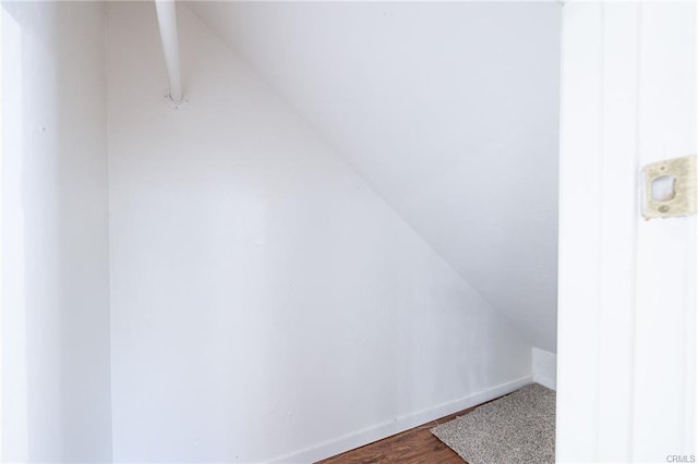 49400 River Park Rd Unit 17, Oakhurst, CA 93644 - additional living space with vaulted ceiling and wood finished floors