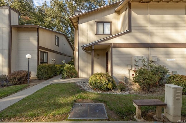49400 River Park Rd Unit 17, Oakhurst, CA 93644 - doorway to property featuring a chimney