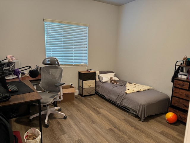 bedroom with light hardwood / wood-style flooring