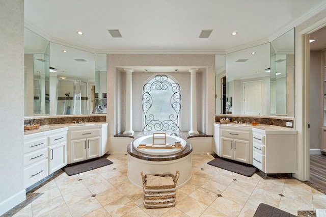 bathroom featuring ornate columns, decorative backsplash, separate shower and tub, vanity, and crown molding