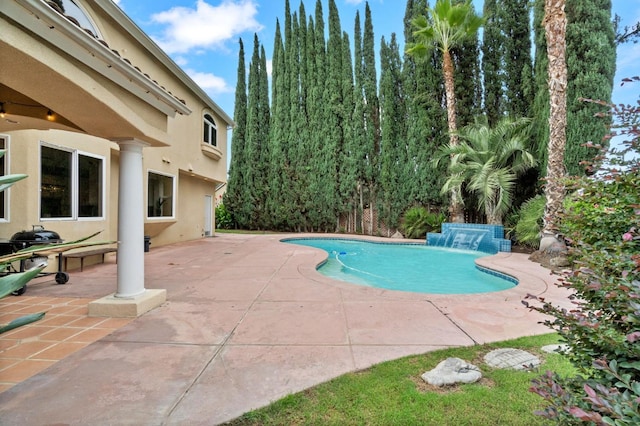 view of swimming pool featuring a patio and pool water feature