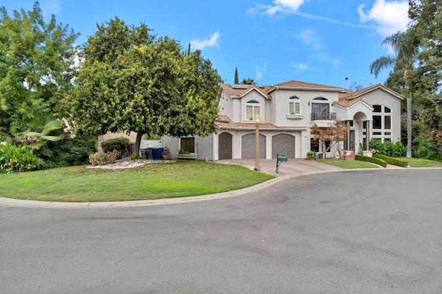 view of front of home featuring solar panels, a front lawn, and a garage