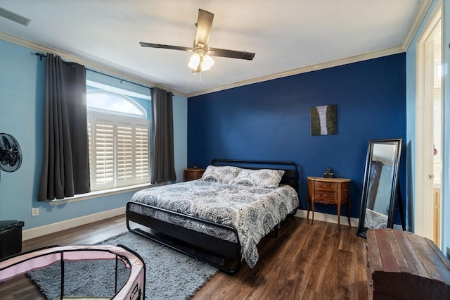 bedroom with ceiling fan, hardwood / wood-style flooring, and ornamental molding