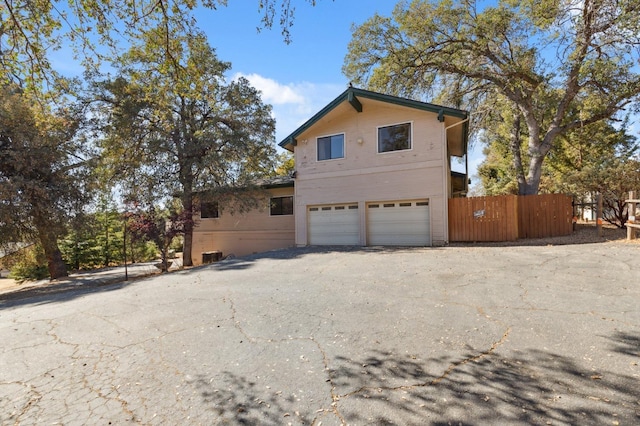 view of home's exterior featuring a garage