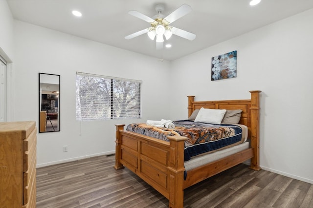 bedroom featuring dark hardwood / wood-style floors and ceiling fan