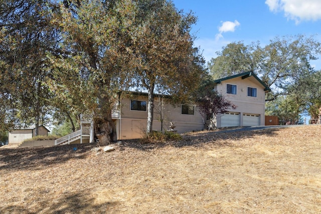 exterior space featuring a garage