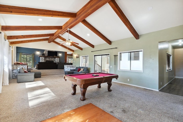 rec room with billiards, carpet, ceiling fan, vaulted ceiling with beams, and a fireplace