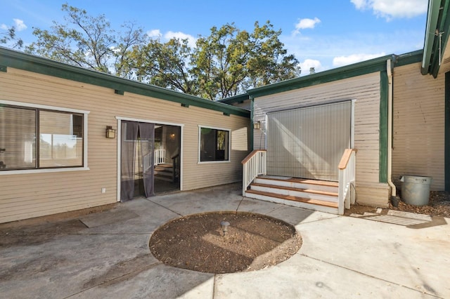 rear view of house with a patio