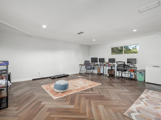 office space featuring baseboards, visible vents, and recessed lighting