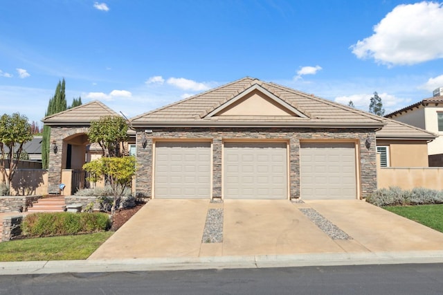 view of front of property with a garage