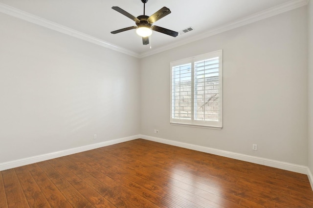 spare room featuring ornamental molding, hardwood / wood-style floors, and ceiling fan