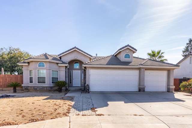 view of front of property featuring a garage