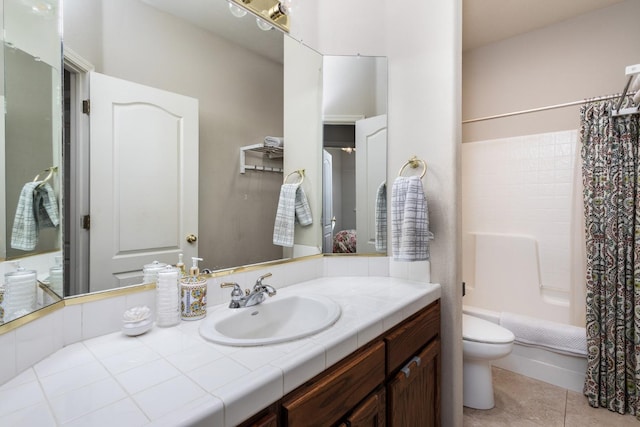 full bath with toilet, tile patterned flooring, shower / bath combo with shower curtain, and vanity