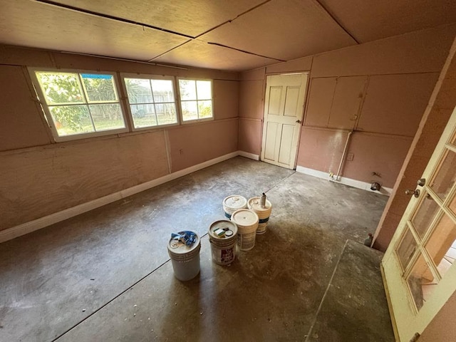 interior space featuring concrete floors