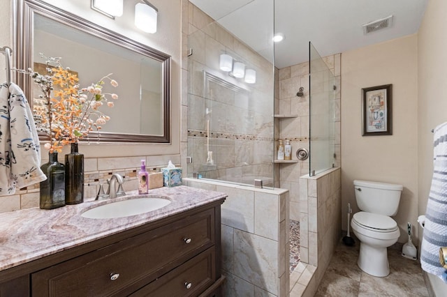 full bath featuring visible vents, tile patterned flooring, vanity, toilet, and walk in shower